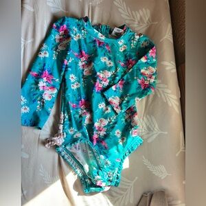 Rufflebutts Teal Floral Long-Sleeve Swimsuit with Pink & White Flowers